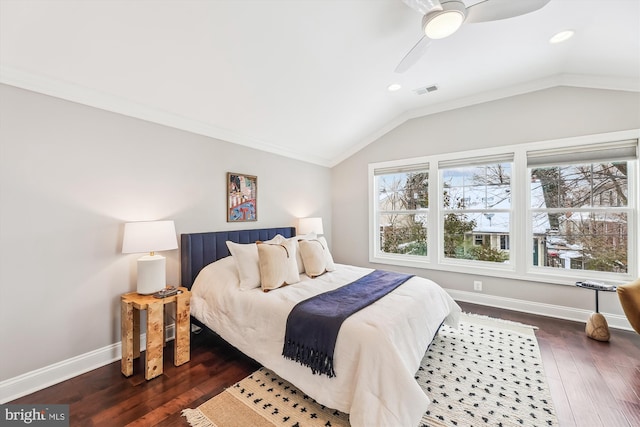 bedroom with ornamental molding, dark wood-type flooring, ceiling fan, and lofted ceiling