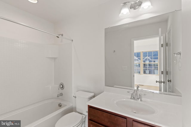 full bathroom with vanity, toilet, and shower / washtub combination