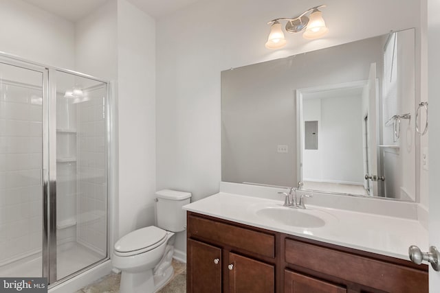 bathroom with vanity, electric panel, toilet, and a shower with shower door