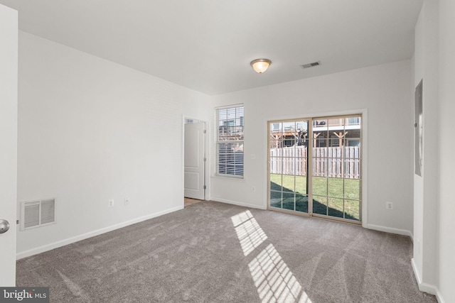 view of carpeted spare room