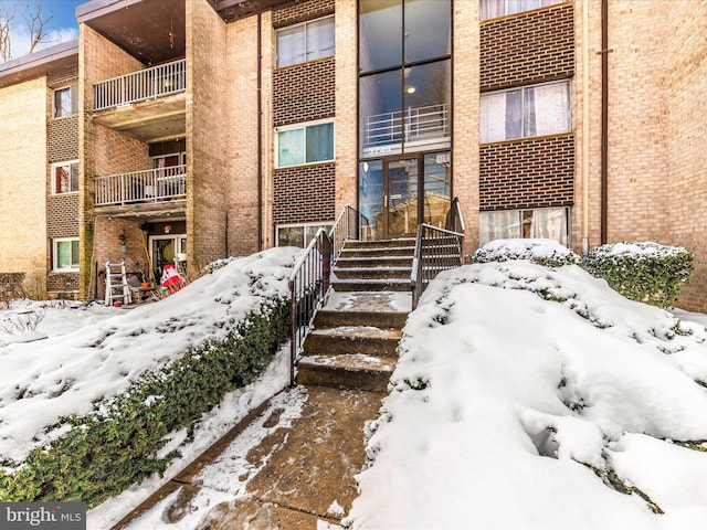 view of snow covered building