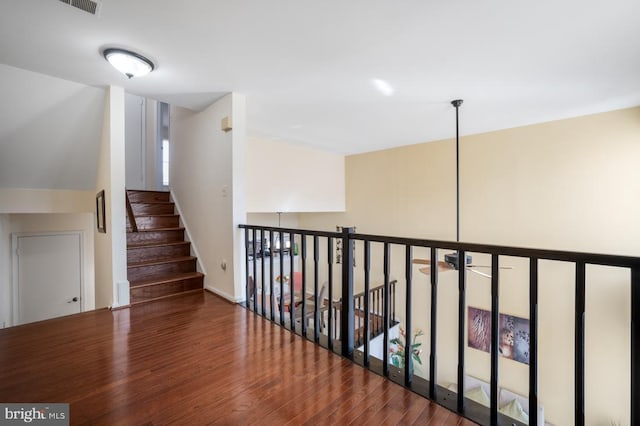 hallway with wood finished floors