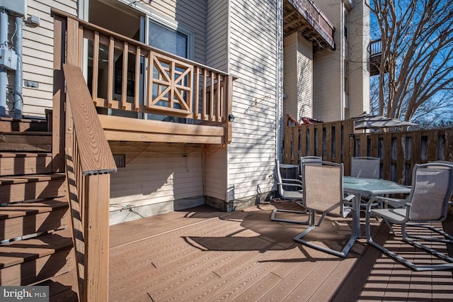 wooden deck with outdoor dining space