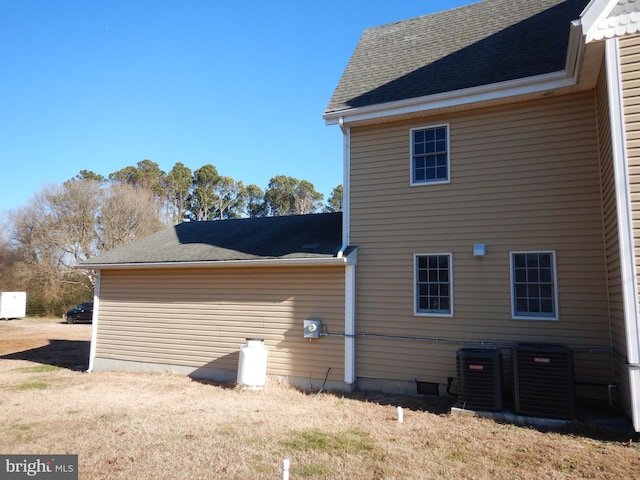 view of home's exterior with central air condition unit