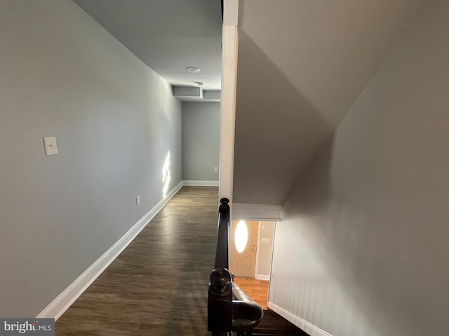 hallway featuring dark wood-type flooring