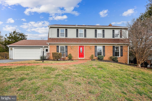 front facade with a garage and a front lawn