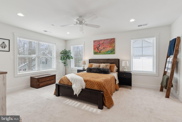 carpeted bedroom featuring ceiling fan