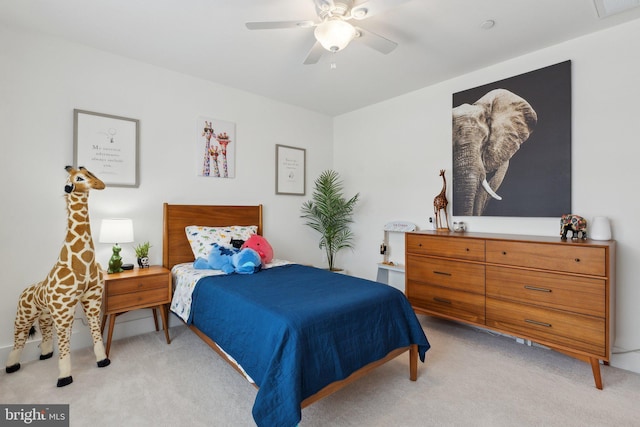 carpeted bedroom with ceiling fan