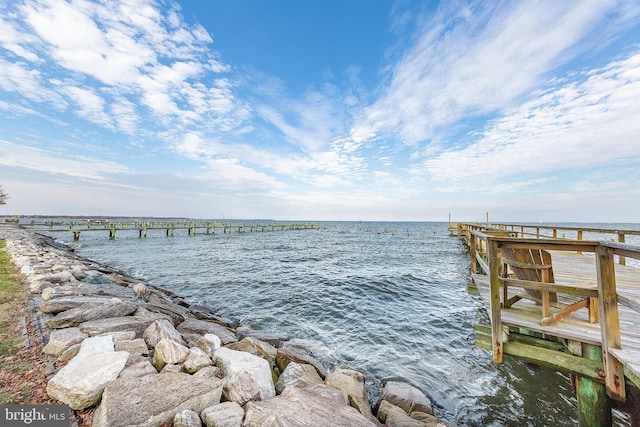 dock area featuring a water view