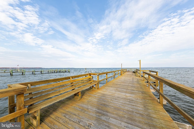 view of dock with a water view