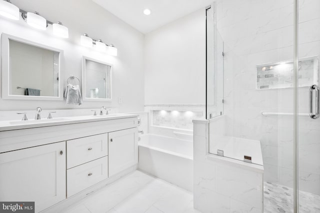 bathroom featuring vanity and plus walk in shower