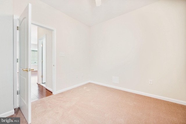 unfurnished room with carpet floors