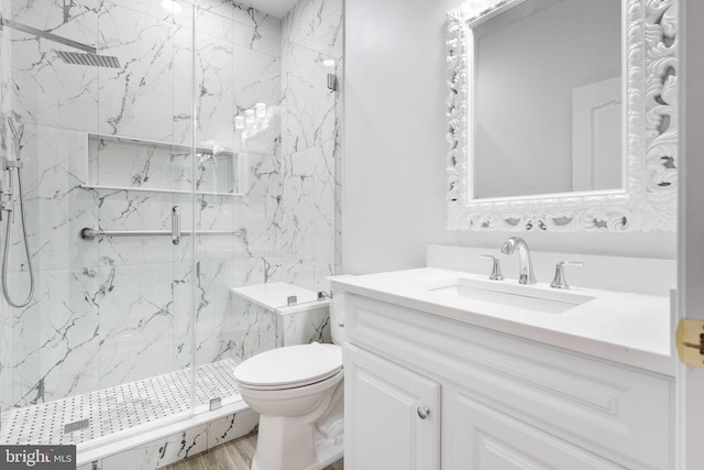 bathroom with walk in shower, vanity, toilet, and hardwood / wood-style flooring