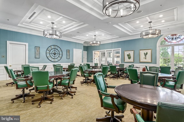 carpeted dining room featuring crown molding, coffered ceiling, a wealth of natural light, and a chandelier