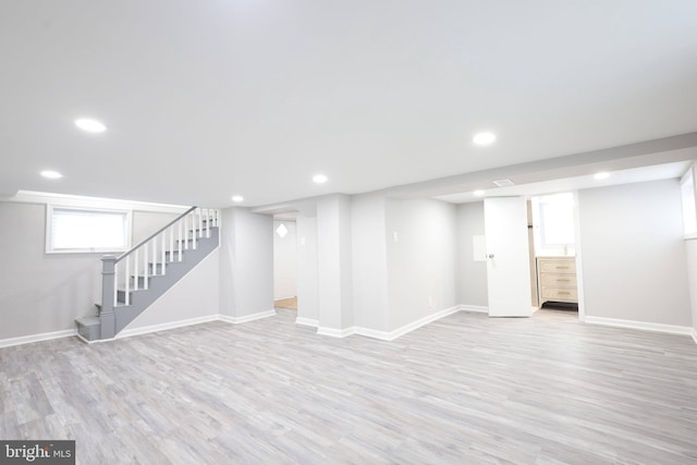 basement with light wood-type flooring