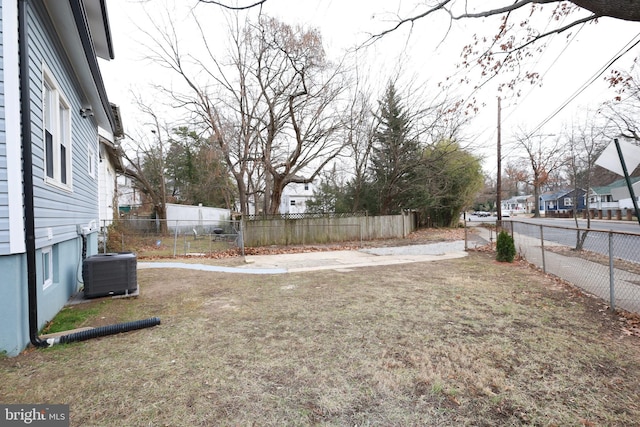 view of yard featuring central AC