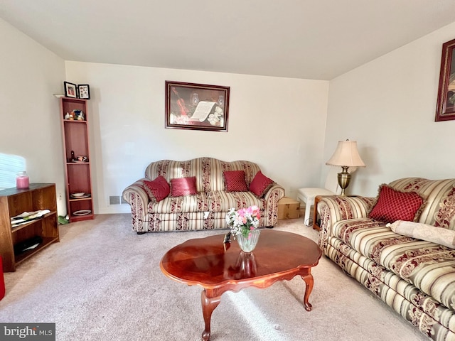 living room with light colored carpet