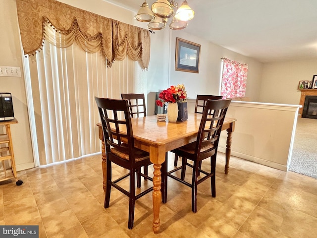 dining room featuring an inviting chandelier