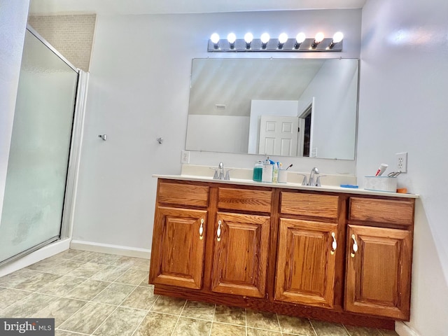 bathroom with vanity and walk in shower