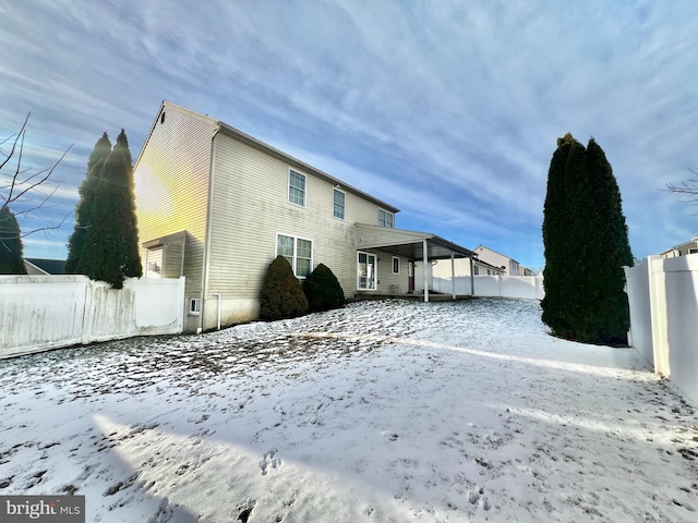 view of snow covered property