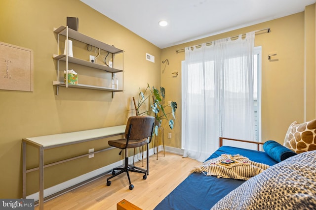 office area with hardwood / wood-style flooring