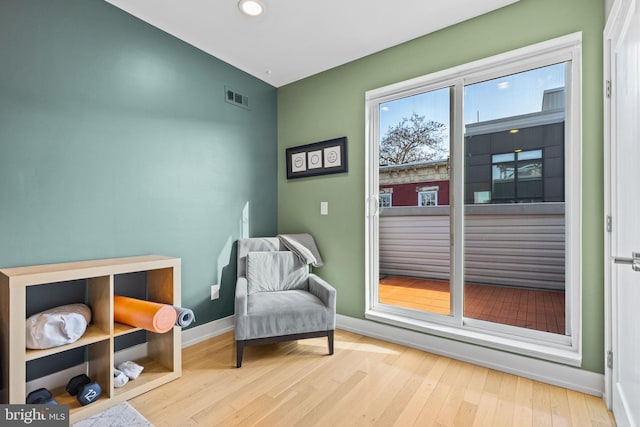 sitting room featuring light wood-type flooring