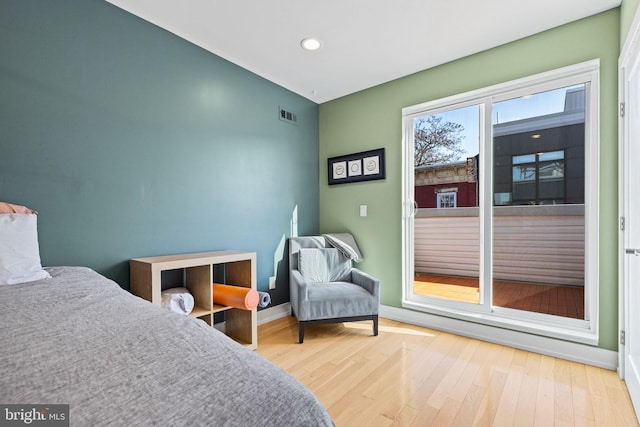 bedroom featuring light hardwood / wood-style floors