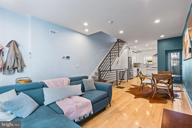 living room featuring light wood-type flooring