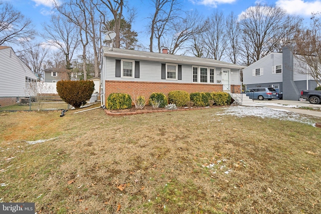 view of front of home with a front lawn