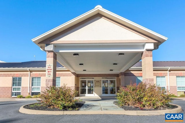 property entrance with french doors