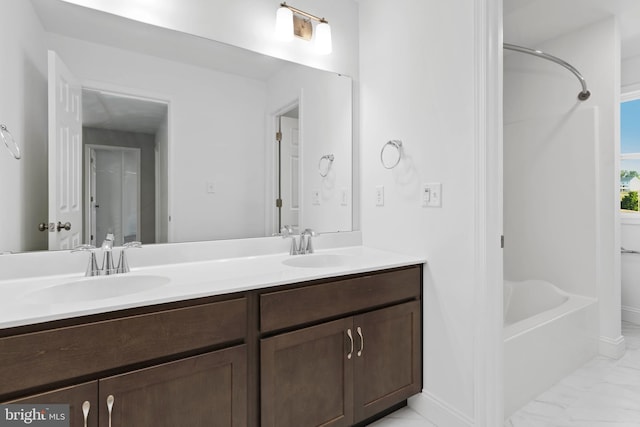 bathroom with shower / bath combination and vanity