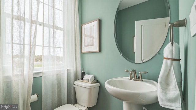 bathroom with toilet and sink