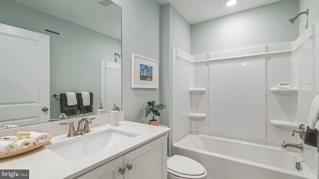 full bathroom with vanity, toilet, and bathing tub / shower combination