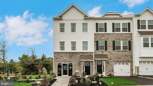 view of property featuring a garage