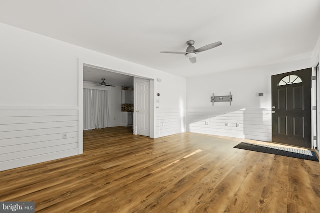 entrance foyer featuring ceiling fan and hardwood / wood-style flooring