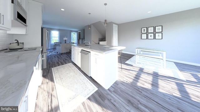 kitchen featuring pendant lighting, dark hardwood / wood-style floors, light stone countertops, white cabinetry, and stainless steel appliances