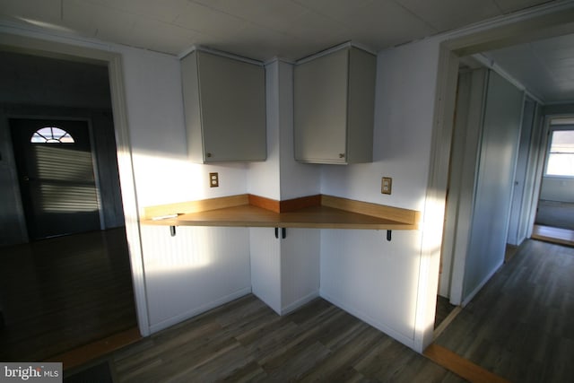 kitchen featuring dark hardwood / wood-style floors and butcher block counters