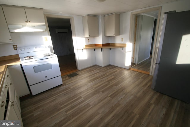 kitchen featuring wood counters, stainless steel fridge, dark hardwood / wood-style flooring, white range with electric stovetop, and exhaust hood