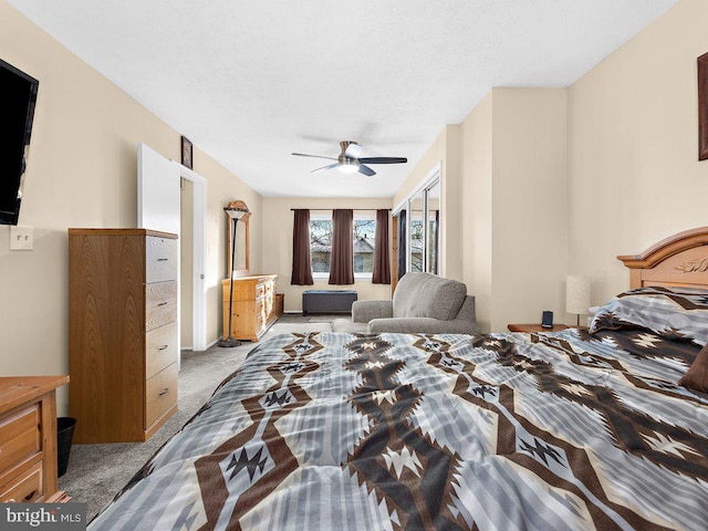 bedroom featuring ceiling fan and light colored carpet