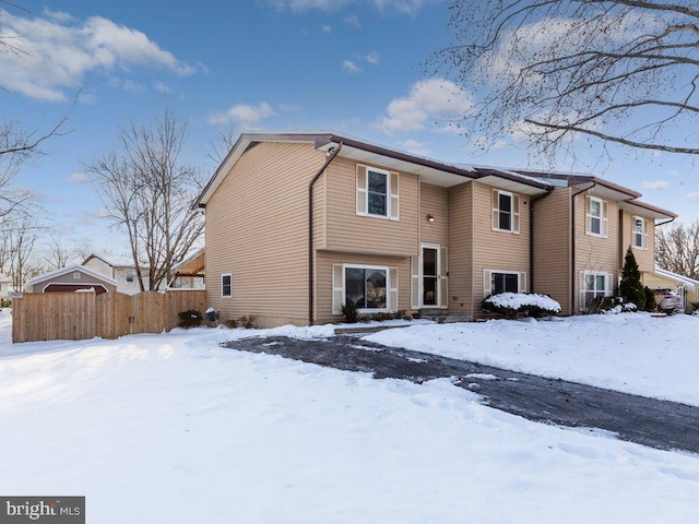 view of snow covered house