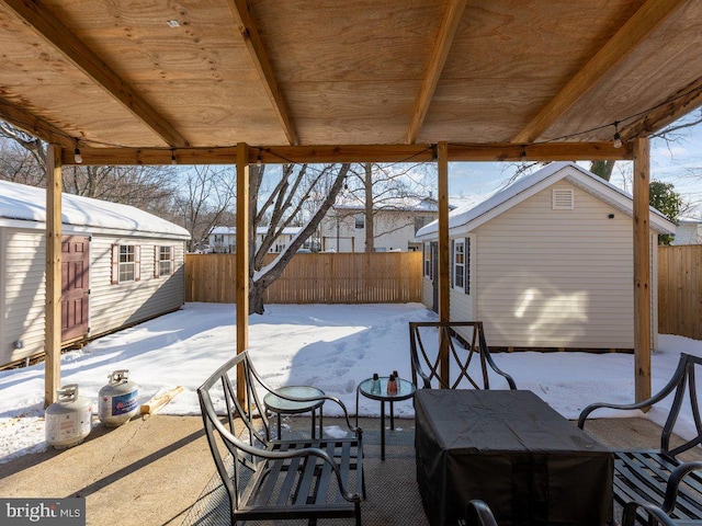 view of snow covered patio