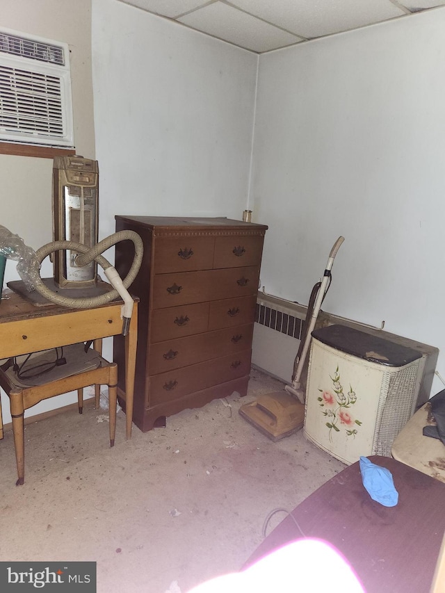 living area with a wall mounted AC