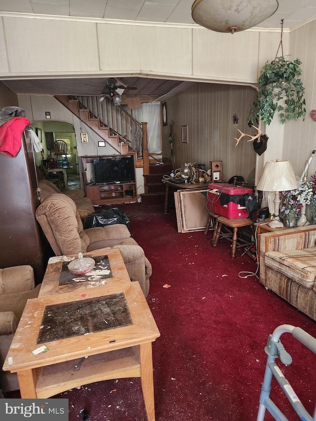 living room with dark carpet