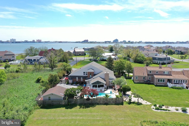 birds eye view of property featuring a water view