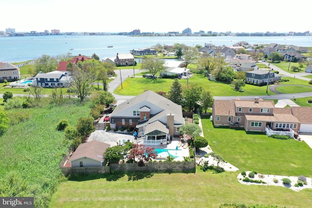 birds eye view of property featuring a water view