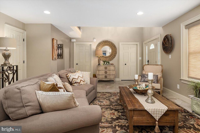 living room with light tile patterned floors