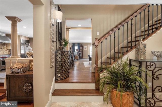 foyer with ornate columns