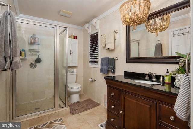 bathroom featuring vanity, crown molding, toilet, a notable chandelier, and a shower with shower door