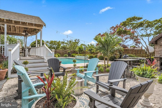 view of patio / terrace with a swimming pool side deck