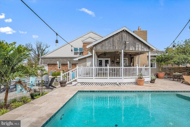 back of property featuring a patio area